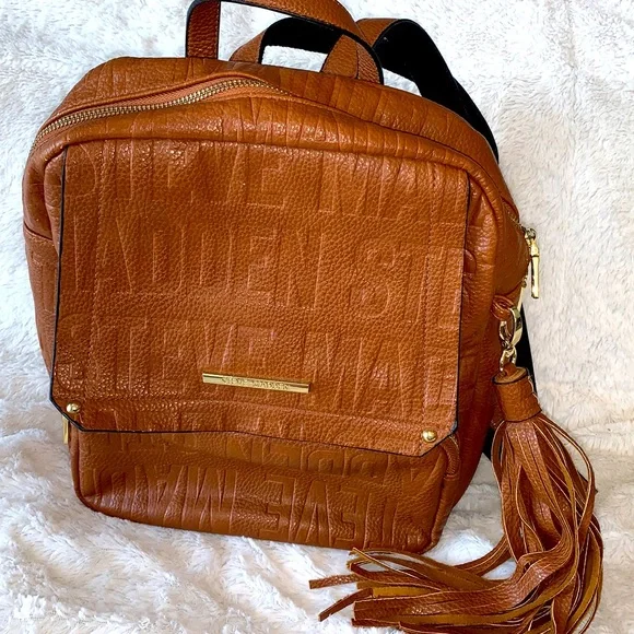 Steve Madden Tan Leather mini backpack purse with tassel and many compartments - Picture 1 of 7